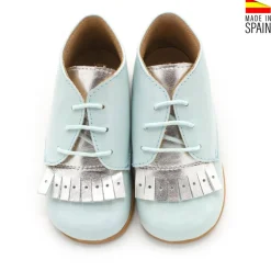 Botín charol azul lengüeta plata