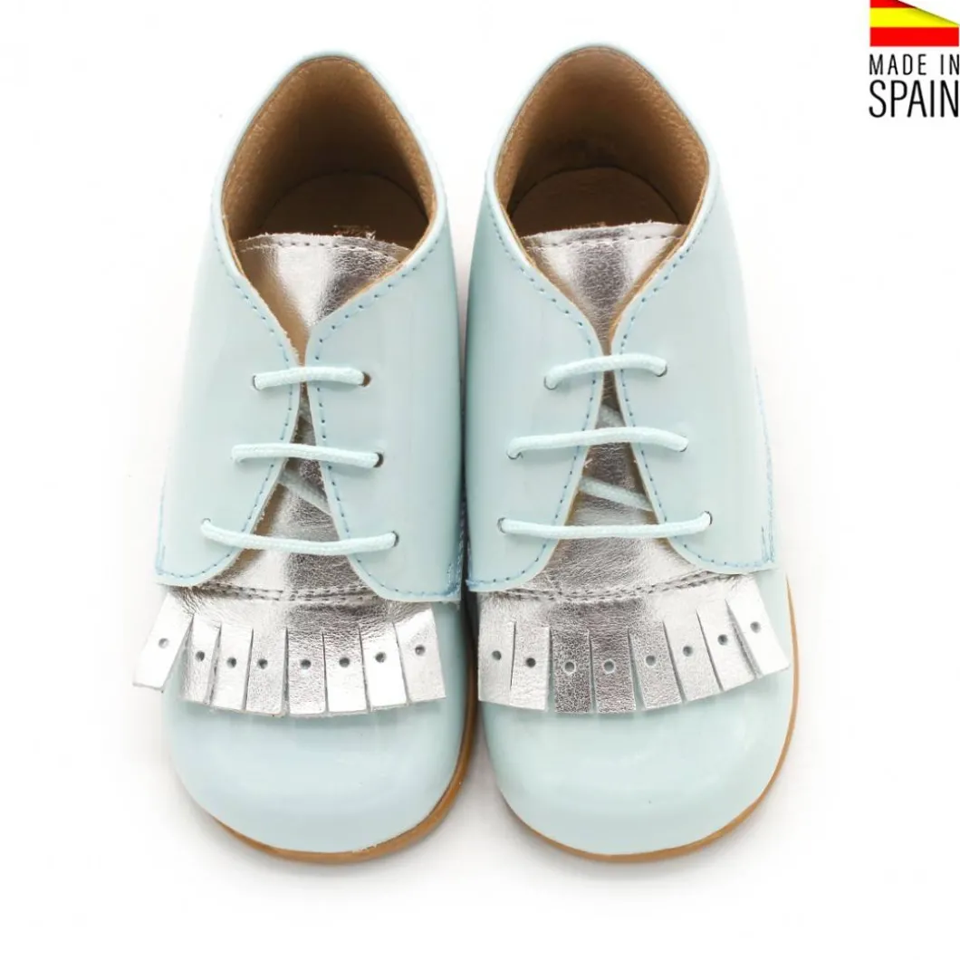 Botín charol azul lengüeta plata