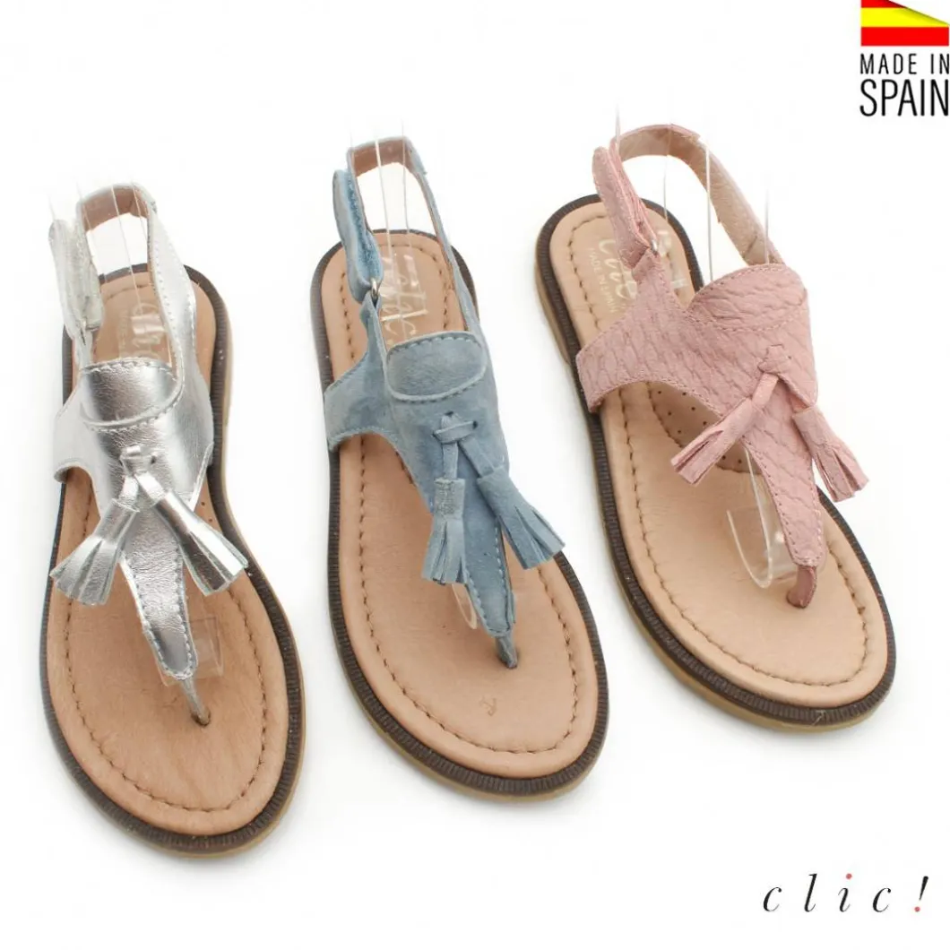 SANDALIAS NIÑA DEDO BORLAS