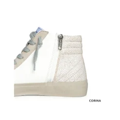 Zapatilla abotinada tachas blanca
