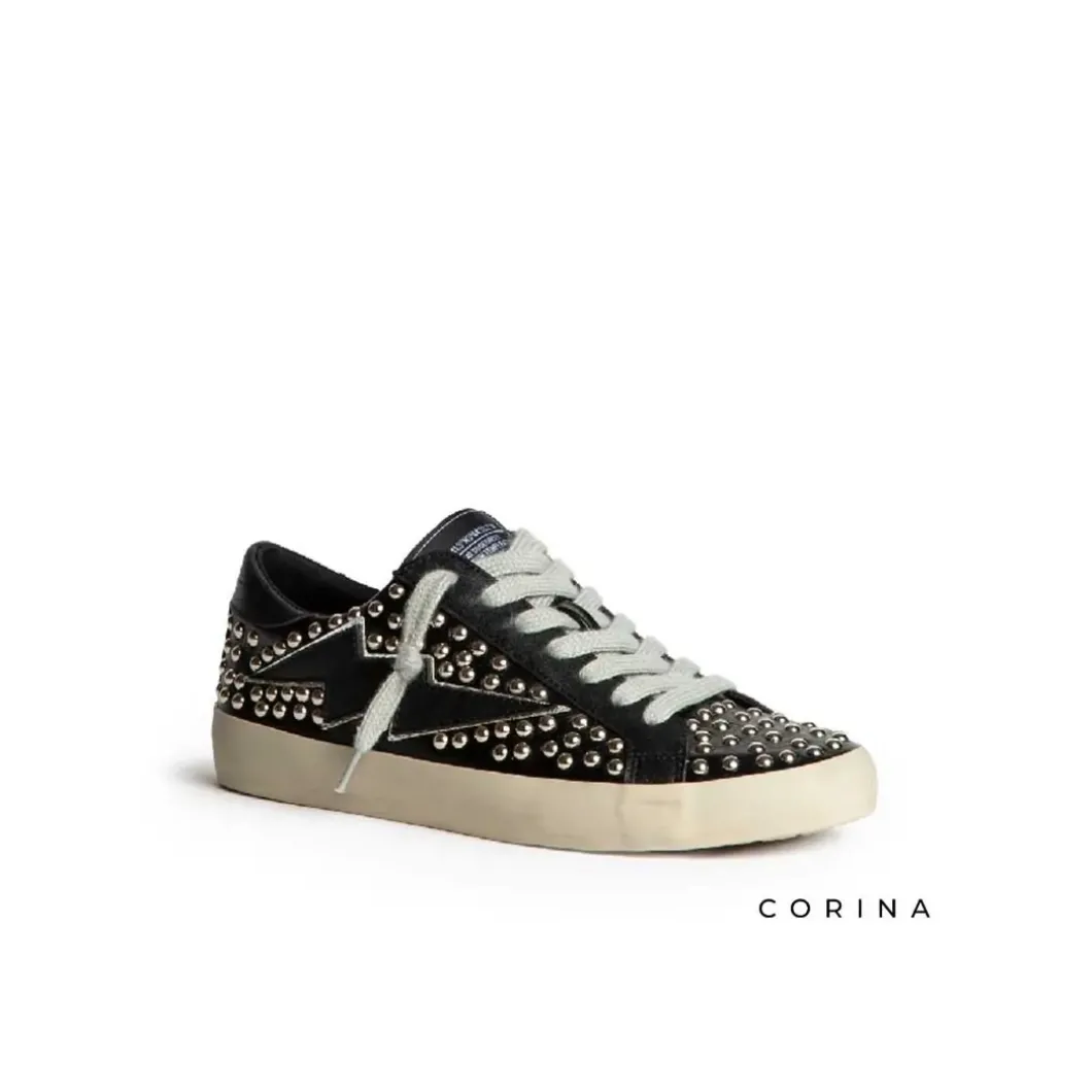 Zapatillas tachuelas efecto cuero negro