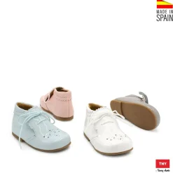 ZAPATO ABOTINADO LENGÜETA CHAROL
